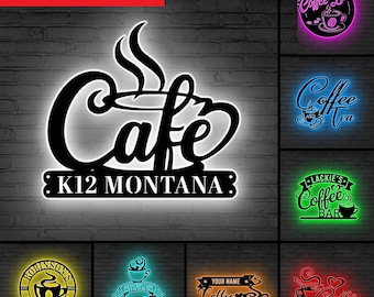 May include: Black metal "Cafe" sign with "K12 Montana" below, illuminated with white light. The image also shows examples of other illuminated coffee bar signs in various colours and styles, including "Mrs. Looney's Coffee Bar".