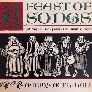 May include: A white ceramic mug with a black handle and the text "But First, Coffee" in a black, handwritten-style font. The mug is on a white surface.