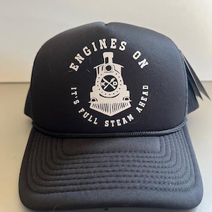 May include: Black trucker hat with a white graphic of a train engine and the text "Engines On It's Full Steam Ahead".