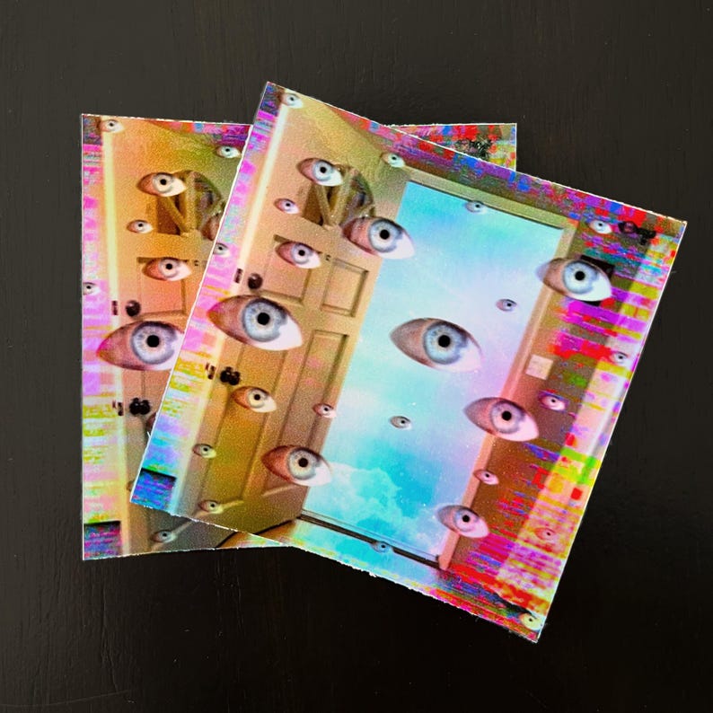 May include: Two colorful stickers with a psychedelic design featuring a door with a sky behind it. The door is covered in eyes and there are more eyes floating in the sky.