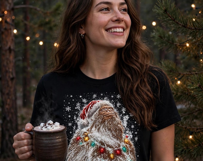 Bigfoot Christmas Shirt | Sasquatch Santa Hat Christmas Lights Tee | Funny Bigfoot Holiday T-Shirt | Cryptid Christmas Gift