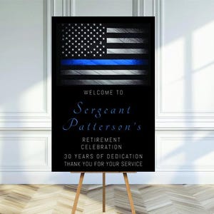 May include: A black and white welcome sign with a thin blue line American flag. The sign reads "Welcome to Sergeant Patterson's Retirement Celebration 30 Years of Dedication Thank You for Your Service".