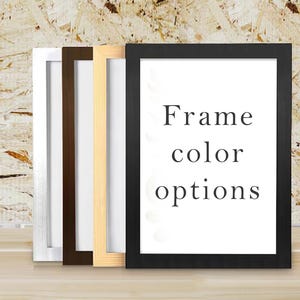 May include: Four picture frames in different colours: white, dark brown, light wood, and black. The frames are displayed together, with the text "Frame color options" visible inside the black frame.