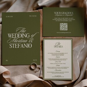 An olive green wedding program card with white text sits beside a details card and two silver rings on fabric.