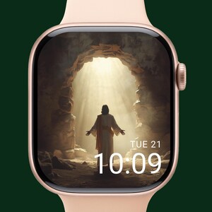 Puede incluir: Un reloj inteligente de oro rosa con una pantalla que muestra una escena religiosa. La imagen muestra una figura con una túnica blanca con los brazos extendidos frente a una cueva de piedra. La hora 10:09 y la fecha Mar 21 se muestran.
