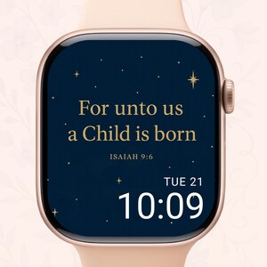 Op de afbeelding: Een roségouden smartwatch toont de tekst "For unto us a Child is born" in gouden letters tegen een donkerblauwe achtergrond met kleine witte sterren. De tijd is 10:09 uur op dinsdag 21.