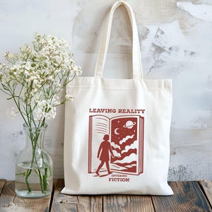 Book Lover Tote Bag Gift, Leaving Reality Entering Fiction, Aesthetic Bookish Bag, Reading Lover Bag, Bibliophile Gift, Book Bag, Back To School Bag, Book Bag Gift, Bookworm Gift, Tote Bag For School, Literary Tote Bag Gift, Cute Reusable Book Bag, Book Club Gift, bookish gifts, bookish merch, librarian gifts, reading accessories, love reading, teacher tote bag