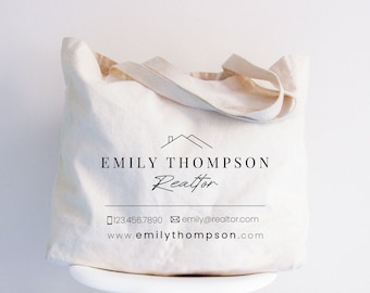 May include: White canvas tote bag with black text that reads "Emily Thompson Realtor" and contact information including a phone number, email address, and website.