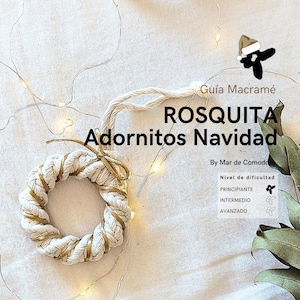 May include: A white and gold macrame wreath ornament with the text "ROSQUITA Adornitos Navidad" and "By Mar de Comodo" in Spanish. The text "Nivel de dificultad" is also included, followed by the words "PRINCIPIANTE", "INTERMEDIO", and "AVANZADO".