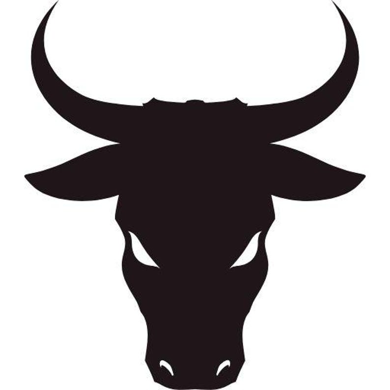 May include: A black silhouette graphic of a bull head facing forward. The design features large, curved horns extending outward and upward, pointed ears, and sharp, angular white eye shapes set against the solid black form of the animal's face.
