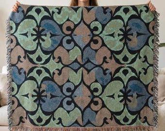 Utsmyckad blommig vävd filt, pläd i vintagestil med rullmönster, elegant dekor i jordfärger