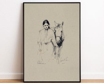 May include: A framed digital download art print featuring a sketch of a person with a horse. The artwork is in black and white, with the words "DIGITAL DOWNLOAD" at the top. The print has a neutral color palette.