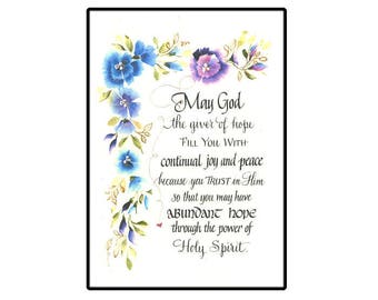 May include: A watercolor painting of blue and purple flowers with a white background. The painting includes a quote that reads: "May God the giver of hope FILL YOU WITH continual joy and peace because you TRUST in Him So that you may have Abundant hope through the power of Holy Spirit."