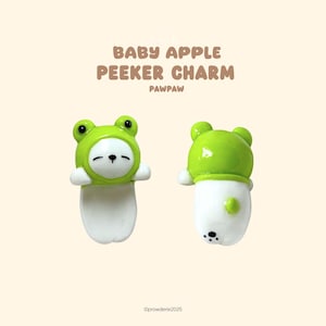 Handgemaakte telefoonbedel van polymeerklei: hoodie papagaaikikker