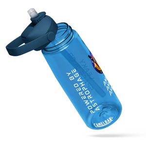 May include: A blue water bottle with a dark blue cap and handle. The bottle has the text "POWERED BY ASTROPHAGE" and "CAMELBAK" printed on it. The bottle is made of clear plastic.