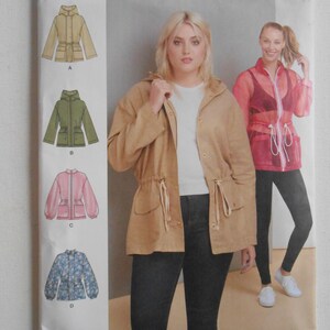 May include: Simplicity sewing pattern S8843 featuring hooded jackets. The pattern includes multiple jacket styles in various colors, with a drawstring waist and pockets. The cover shows a woman wearing a tan jacket. The pattern size is L-XXL.