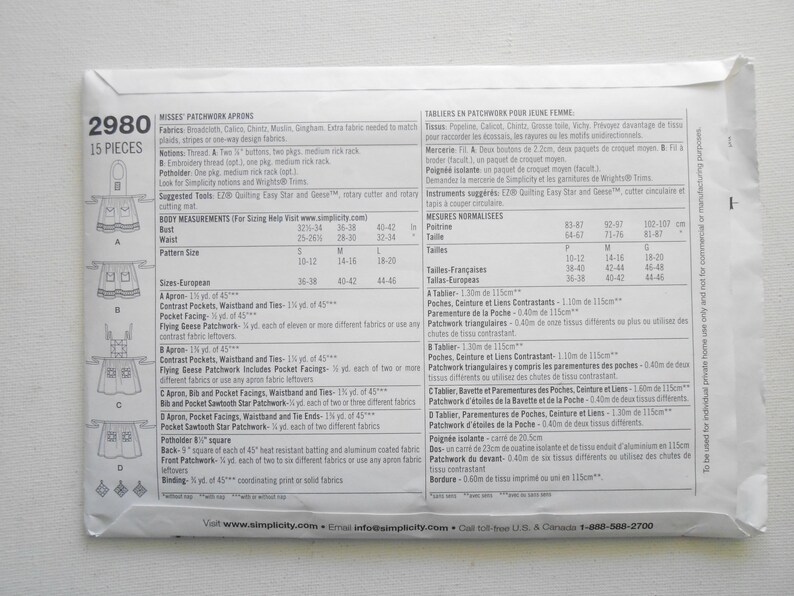 May include: A white paper pattern envelope for Misses' Patchwork Aprons, featuring diagrams of apron designs. The envelope includes size charts and fabric requirements. The pattern is labeled "2980" and includes 15 pieces.