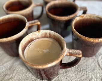 Set of six McCoy USA American pottery coffee mugs