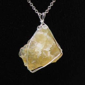 Calcite chunk pendant wrapped with sterling silver wire