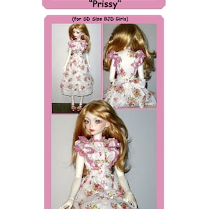 May include: A white dress with pink floral print and a pink ruffled collar and sleeves. The dress is for a doll and has a petticoat. The text "Easing the Pattern "Prissy" (for SD Size BJD Girls)" is at the top of the image. The text "One-Piece Dress with Petticoat" is at the bottom of the image.