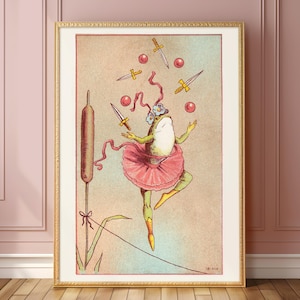 May include: A green frog wearing a pink tutu and a flower crown juggles five red balls and four swords. The frog is standing on a tightrope with a tall green reed in the background.