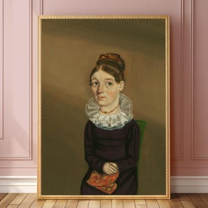 May include: A portrait painting of a woman wearing a dark purple dress with a white lace collar. She has a brown bun in her hair and is holding a red and orange patterned book in her lap.