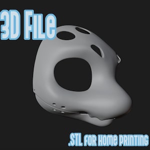 Puede incluir: Una máscara gris impresa en 3D con grandes aberturas para los ojos y la boca, y pequeños orificios de ventilación. El texto "3D FILE" y "STL FOR HOME PRINTING" está en azul claro, indicando un archivo digital para impresión doméstica.