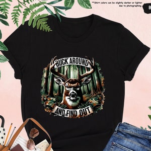 a women's black shirt with a picture of a deer on it