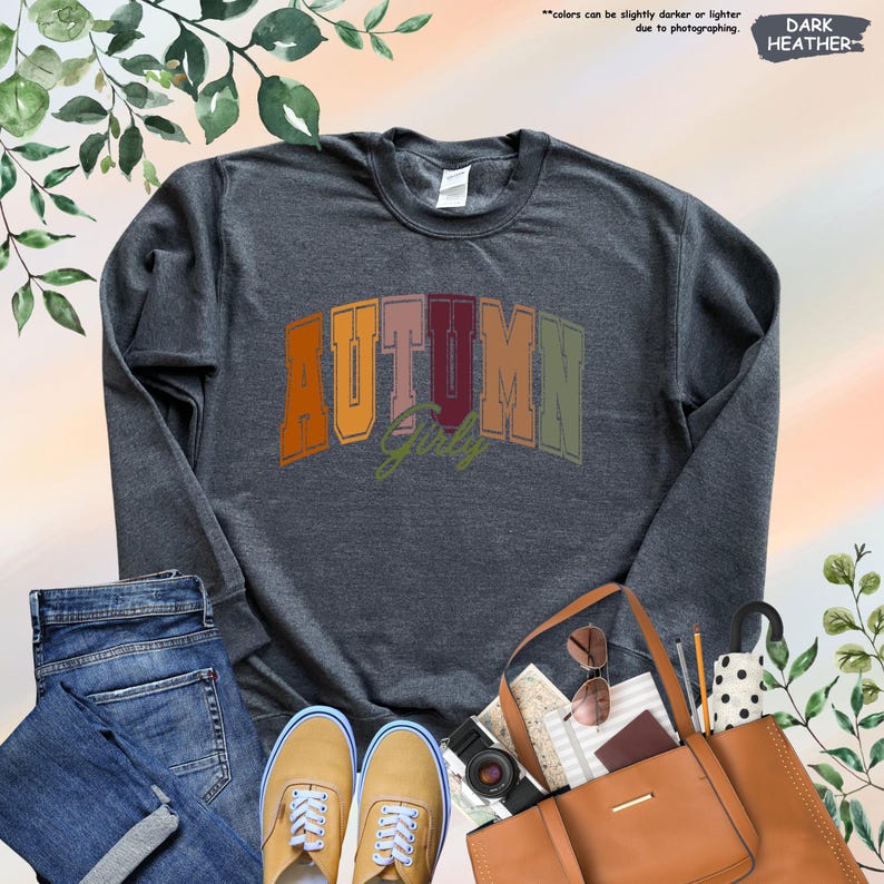 a gray shirt with the word autumn printed on it