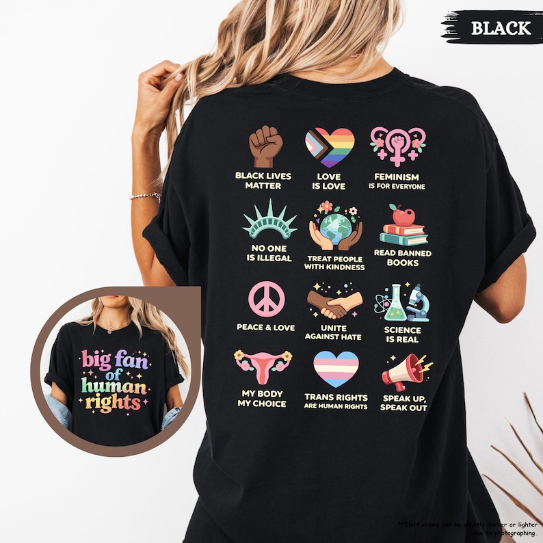 May include: Black t-shirt with various social justice graphics, including a raised fist, a rainbow heart, and the text "Black Lives Matter." The shirt also features the text "big fan of human rights."