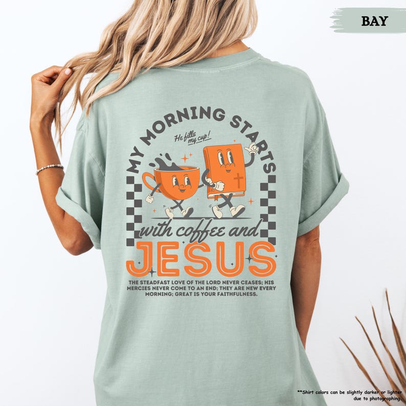 May include: A light blue t-shirt with a graphic of a coffee cup and a bible dancing with the text "My Morning Starts with Coffee and Jesus". The text "He fills my cup!" is above the graphic. The text "The steadfast love of the Lord never ceases: His mercies never come to an end; they are new every morning: Great is your faithfulness." is below the graphic.