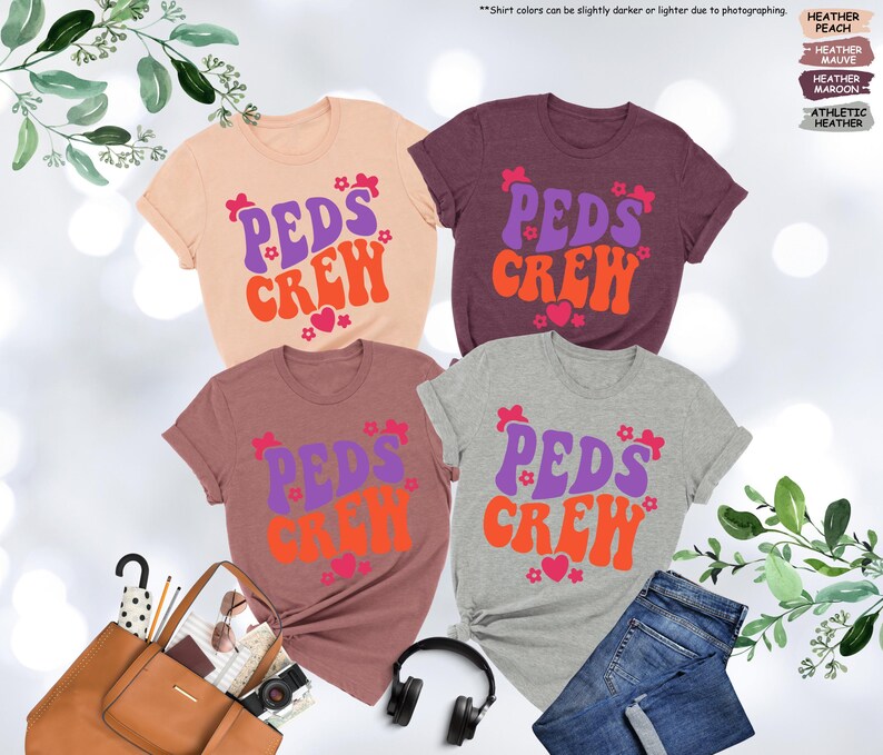 May include: Four t-shirts with the text "PEDS CREW" in a retro font. The shirts are in different colors: peach, mauve, maroon, and heather grey.