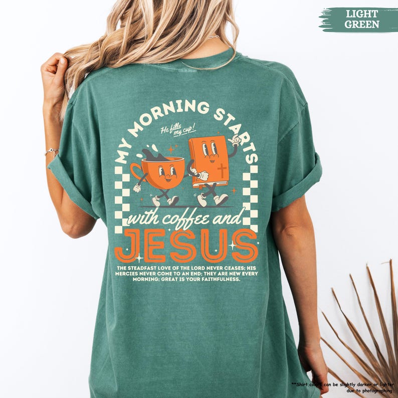 May include: A light green t-shirt with a retro-style graphic of a coffee cup and a bible with the text "My Morning Starts with Coffee and Jesus". The text "He fills my cup!" is above the graphic. The text "The steadfast love of the Lord never ceases: His mercies never come to an end: They are new every morning: Great is your faithfulness." is below the graphic.