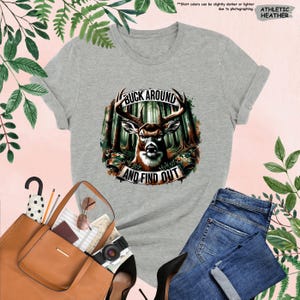 a t - shirt with a picture of a deer on it