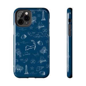 May include: A navy blue phone case featuring a white nautical pattern. The design includes illustrations of seashells, sailboats, lighthouses, and a map outline. The case has a glossy finish and a dark blue border.
