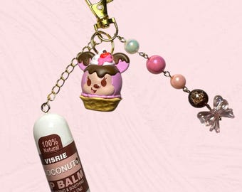 Llavero con cuentas y dijes de bálsamo labial de Minnie Mouse Disney Munchlings