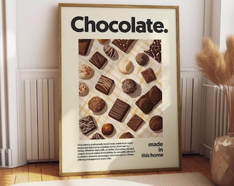 May include: Framed art print featuring an assortment of chocolates in various shapes and sizes. The word "Chocolate" is at the top, with the text "made in this home" at the bottom. The print has a beige background and a wooden frame.