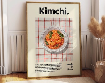 May include: A poster with a red and white checkered background featuring a bowl of kimchi, a traditional Korean fermented dish. The poster has the text "Kimchi." and "made in Korea".