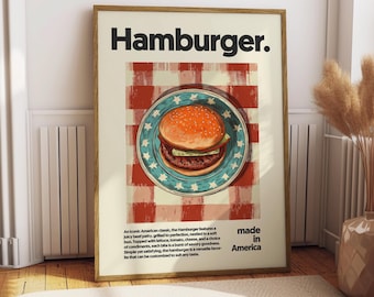 Puede incluir: Un póster enmarcado con la palabra "Hamburger" en letras negras en negrita. La imagen presenta una ilustración estilizada de una hamburguesa en un plato azul con estrellas, sobre un fondo a cuadros rojo y blanco. También está presente el texto "made in America".