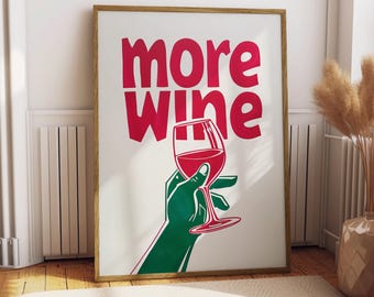 May include: A white poster with a red and green illustration of a hand holding a glass of wine. The text "more wine" is written in red letters.