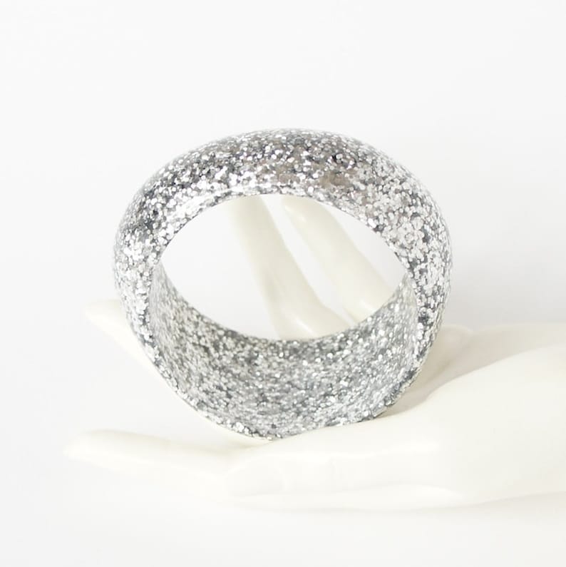 abstract chunky organic statement piece in silver glitter. Resin bangle
