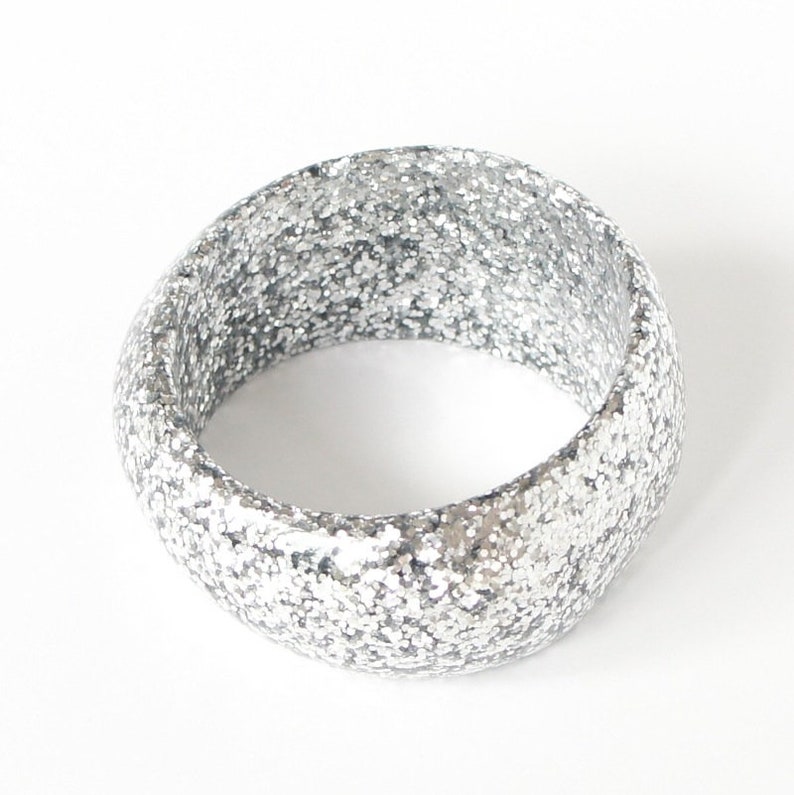 abstract chunky organic statement piece in silver glitter. Resin bangle
