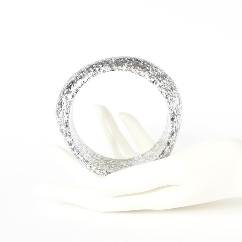 abstract chunky organic statement piece in silver glitter. Resin bangle