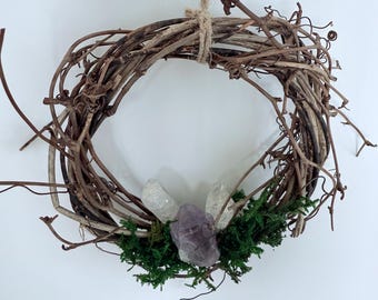 Dreamcatcher full moon vines with amethyst and clear Quartz. Petrified moss