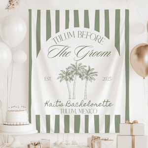 May include: A white and green striped backdrop with the text "Tulum Before The Groom" and palm trees. The text "Kait's Bachelorette Tulum, Mexico" is also included.  The backdrop is perfect for a bachelorette party.