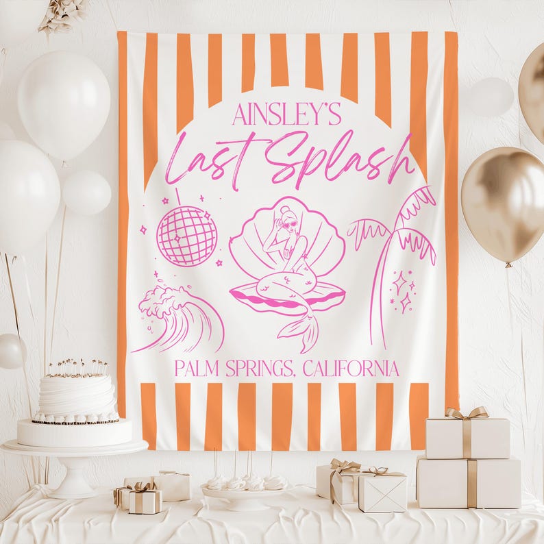 May include: A white and orange striped banner with the text "Ainsley's Last Splash" in pink. The banner features a mermaid illustration, a disco ball, and the words "Palm Springs, California". White balloons and a cake are in the background.
