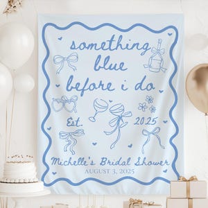 May include: Light blue bridal shower banner with the text "something blue before i do" and the date "August 3, 2025". The banner also features illustrations of a bottle of champagne, two wine glasses, a heart, a bow, and flowers.