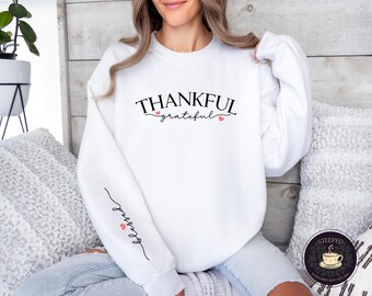 Thankful, Grateful, Blessed Sweatshirt with Sleeve Design. Cozy Sweater, Perfect Gift for Thanksgiving, Fall Weather and Loved Ones.