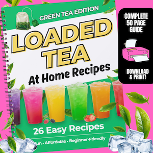 May include: A spiral-bound book titled "LOADED TEA At Home Recipes" with a green tea bag illustration. The cover features colorful drinks in clear cups, ice cubes, and text: "26 Easy Recipes". A black box says "COMPLETE 50 PAGE GUIDE" and "DOWNLOAD & PRINT!"