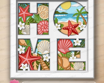 May include: A square white shadow box frame containing a multi-layered paper craft design spelling the word HOME. Each letter features tropical beach elements including red starfish, various tan and pink seashells, green palm leaves, and white flowers.